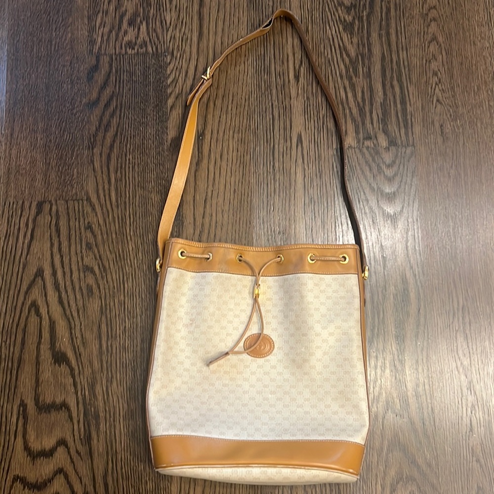 Gucci bucket bag with gold hardware